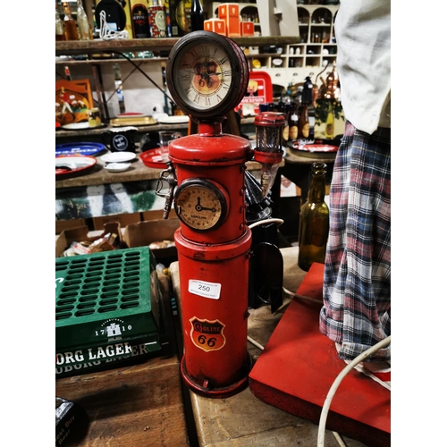 250 - Tinplate model of a Gasoline pump. { 45cm H X 10cm W }.