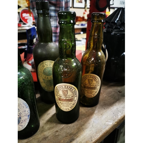 272 - Nine early 20th. C. Guinness bottles with original labels - Katherine Boylan Lurganboy, Patrick Mc T... 