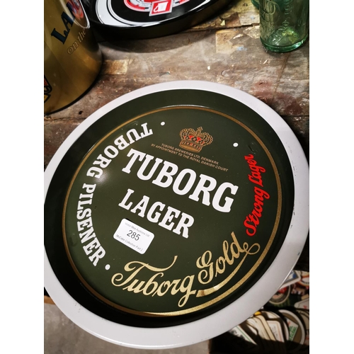 285 - Two Tuborg Lager tinplate drink's trays { Each 27cm Dia }