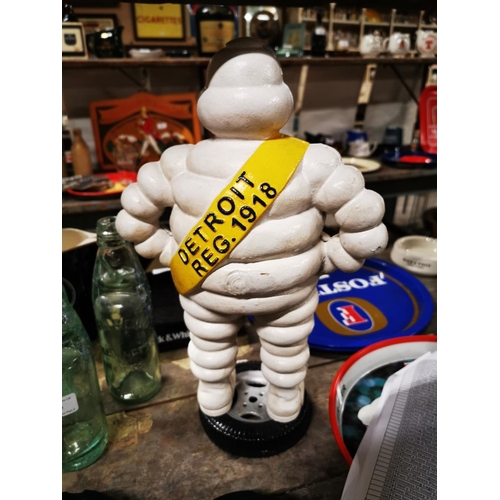 288 - Cast iron Michelin advertising figure. { 39cm H X 24cm W }.