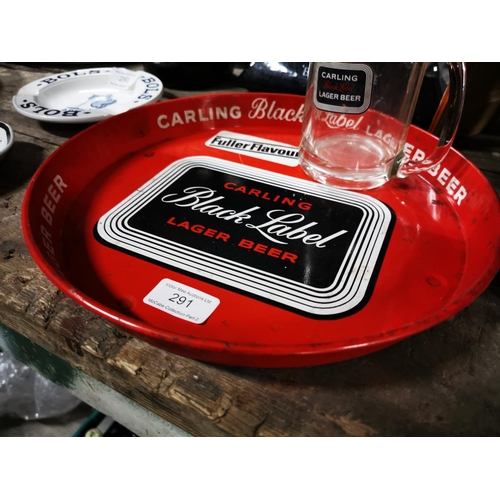 291 - Carling Black Label Lager tinplate drink's tray { 30cm Dia } and pint glass