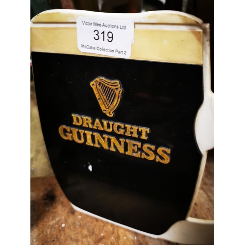 319 - 1950's acrylic Guinness counter advertising stand {21 cm H x 23 cm W}.