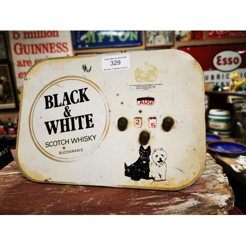 329 - Black and White Scotch Whisky tinplate shelf calendar { 17cm H X 25cm W }.