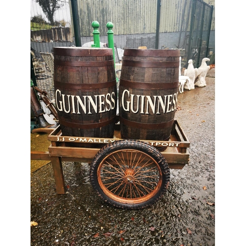 333 - J J O'Malley Westport hand painted cart with two wooden Guinness barrels. { 133cm H X 168cm L X 94cm... 