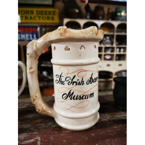 371 - Guinness The Irish Beer Museum ceramic tankard. { 17cm H }.