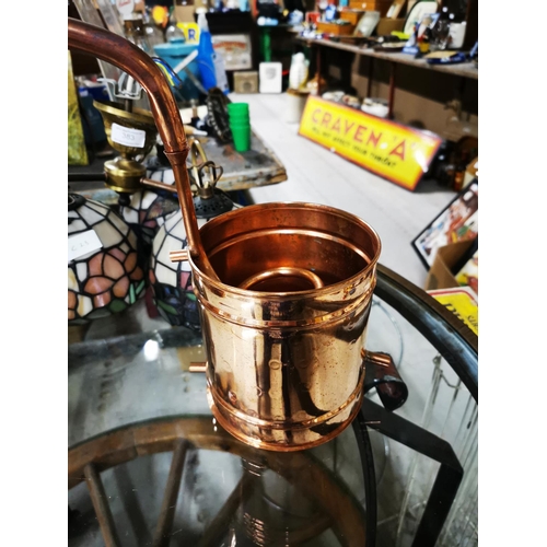 381 - Copper Whiskey still. { 44cm H X 26cm W }.