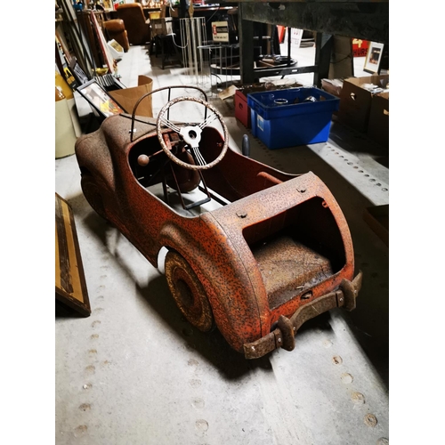 386 - Rare 1940's child's tinplate pedal car possible by Tri-Ang {59 cm H x 121 cm W x 46 cm D}.