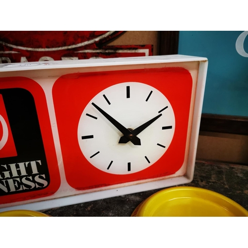 440 - Draught Guinness advertising clock. { 18cm H X 36cm W }.