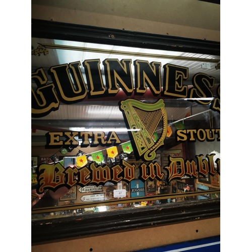 47 - Guinness Extra Stout Made in Dublin advertising mirror. { 67cm H X 96cm W }.