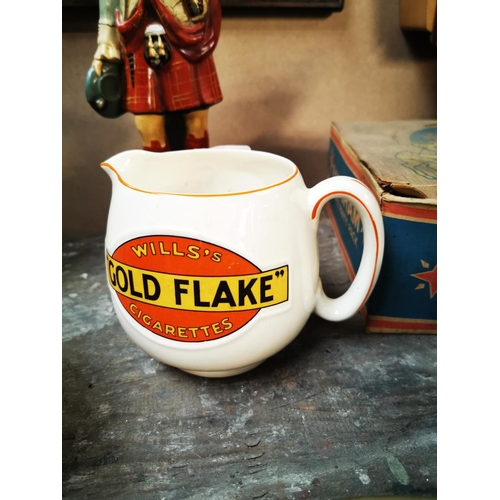 503 - Gold Flake ceramic advertising jug. { 10cm H }.