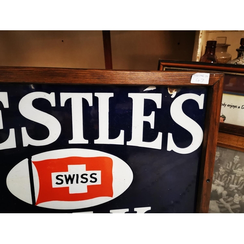 524 - Nestlé's Swiss Milk The Riches in Cream enamel advertising sign. { 48cm H X 63cm W }.