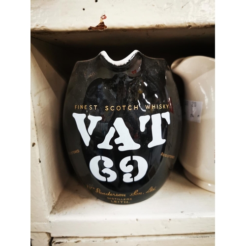 538 - Beefeater Dry Gin & VAT 69 ceramic advertising jugs. { 13cm H smaller. }.