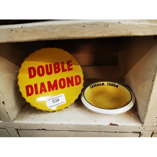 539 - Double Diamond tinplate advertising beer cap and a ceramic Double Diamond ashtray.