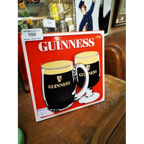 599 - Guinness Perspex advertising shelf sign {19 cm H x 19 cm W}.