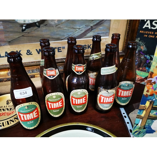 634 - Nine Time Ale bottles with original labels.