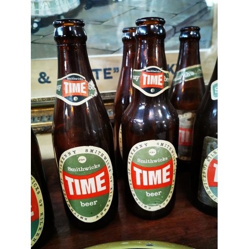 634 - Nine Time Ale bottles with original labels.