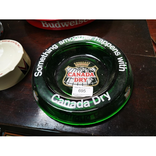 695 - Canada Dry glass advertising ashtray and John Player Vanguard ceramic ashtray.