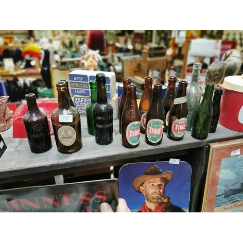 702 - Collection of old Guinness bottles and old Time Beer bottles.