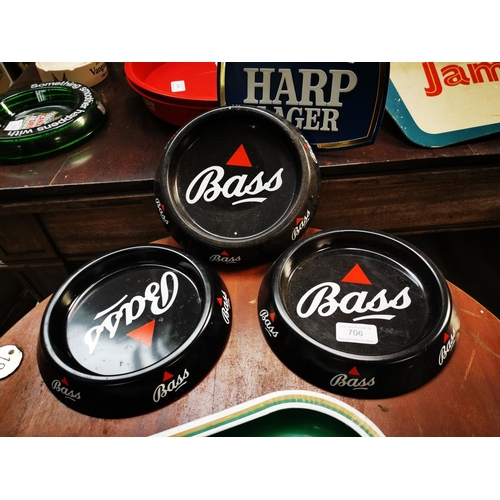 706 - Three Bass tinplate advertising ashtrays.