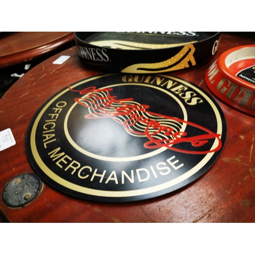 708 - Guinness Perspex advertising drinks tray {31 cm Dia.}, tinplate ashtray and beer mat.