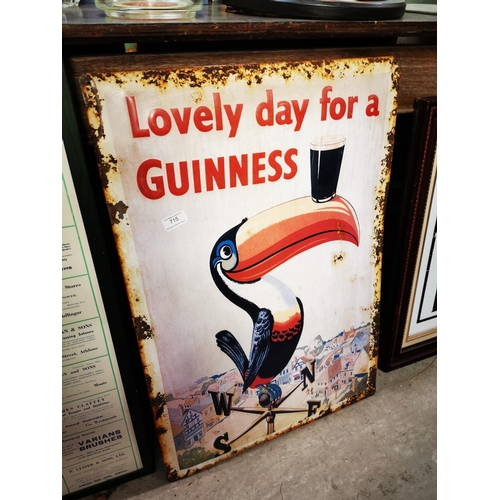 715 - Lovely Day For A Guinness tinplate advertising sign {73 cm H x 50 cm W}.