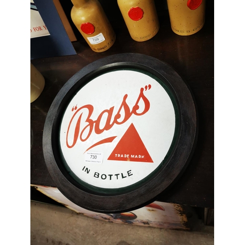 730 - Bass in Bottle framed enamel advertising sign {31 cm H x 31 cm W}.