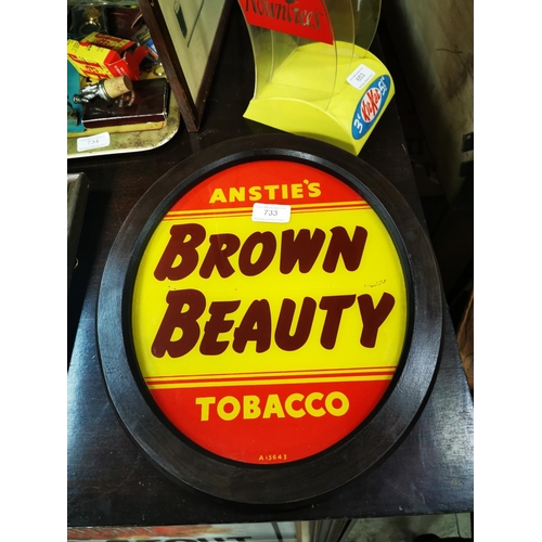 733 - Anstie's Brown Beauty Tobacco reverse painted glass advertising sign {36 cm H x 31 cm W}.