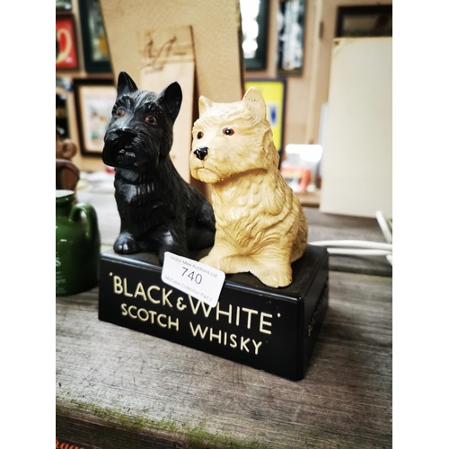 740 - Black and White Scotch Whiskey advertising figure {15 cm H x 13 cm W}.