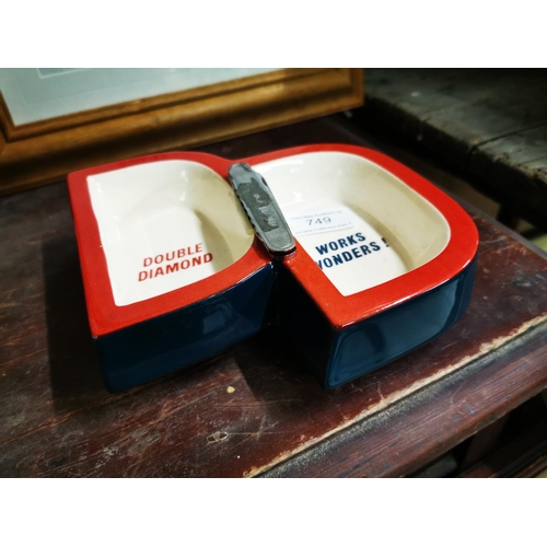 749 - Early 20th C ceramic Double Diamond ashtray and advertising penknife.