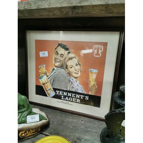 766 - Tennent's Lager advertising print. { 33cm H X 37cm W }.