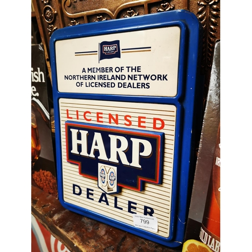 799 - Harp Licensed Dealer plastic advertisement {32 cm h x 24 cm W} with two John Power's showcards {30 c... 