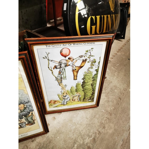 809 - Three framed coloured Guinness prints. {48 cm H x 35 cm W}.