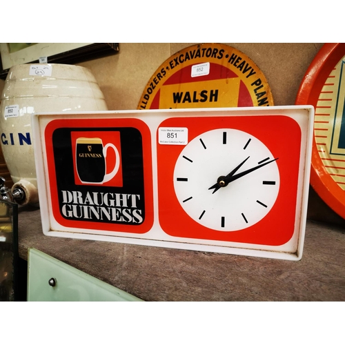 851 - Draught Guinness battery clock. 15 cm H x 36 cm L}