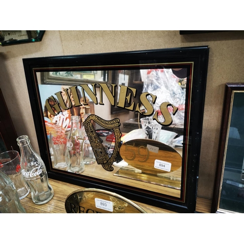 894 - Guinness framed advertising mirror. {37 cm h x 47 cm W].