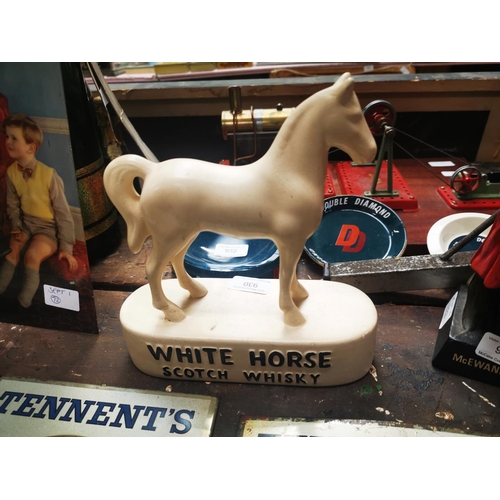 930 - White Horse Scotch Whisky ceramic advertising figure. { 23cm H X 22cm W X 8cm D }.