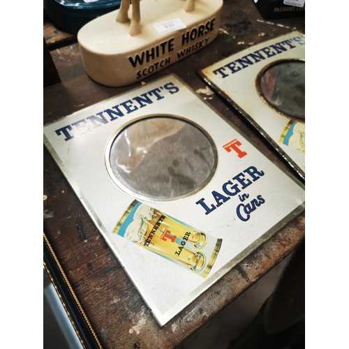 934 - Two Tennent's Lager tinplate advertising mirrors. { 24cm H X 19cm W }