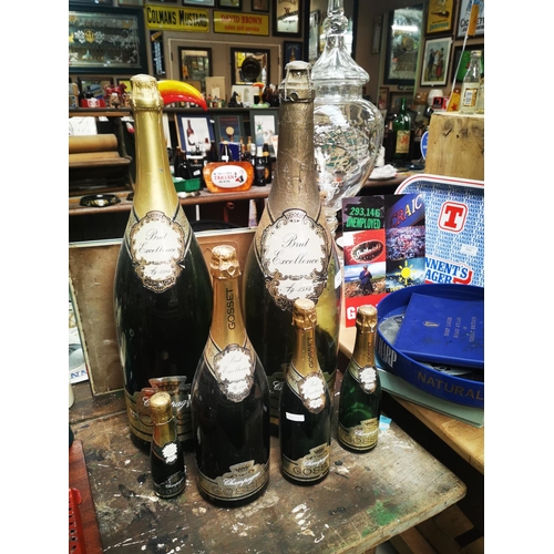 949 - Set of six graduating Gosset display champagne bottles {Largest 63 cm H and Smallest 17cm H}.