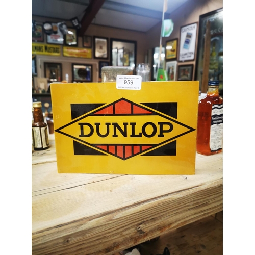 959 - Dunlop double sided tinplate advertising sign {15 cm H x 23 cm W}.