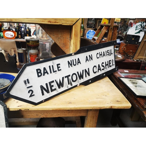 972 - Newtown Cashel 1/2 Mile bi - lingual  finger cast iron post sign. { 28cm H X 96cm W }.