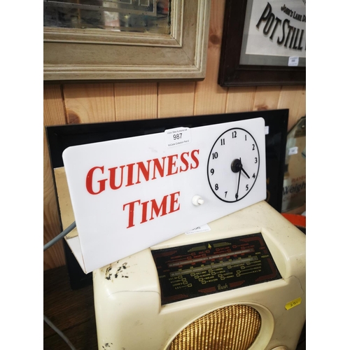 987 - Guinness Time Perspex advertising clock. { 14cm H X 30cm W }.