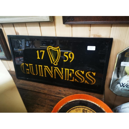 997 - 1759 Guinness advertisement on glass. {34cm H X 63cm W }.