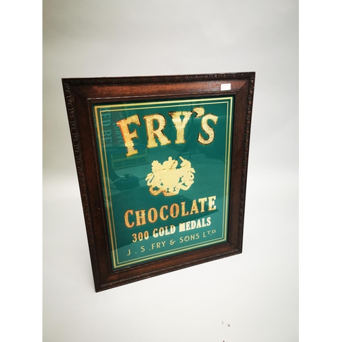 25 - Fry's Chocolate reverse painted glass advertising sign mounted in oak frame {77 cm H x 64 cm W}.