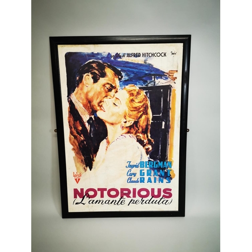 44 - Notorious by Alfred Hitchcock framed film advertising print {108 cm H x 76 cm W}.