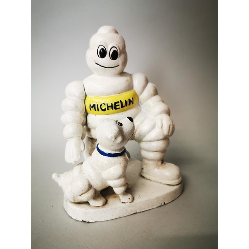 52 - Michelin man cast iron advertising figure {20 cm H x 15 cm W x 15 cm D}.