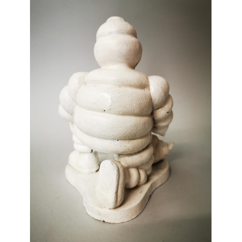 52 - Michelin man cast iron advertising figure {20 cm H x 15 cm W x 15 cm D}.