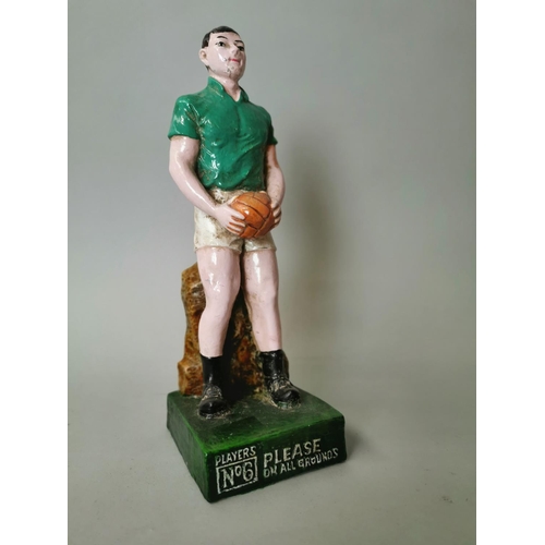54 - Resin model of a Players Please footballer {30 cm H}.