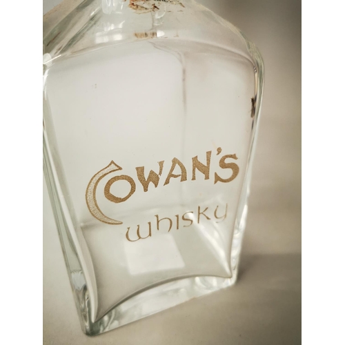 9 - Cowan's Whiskey glass advertising decanter {27 cm H}.