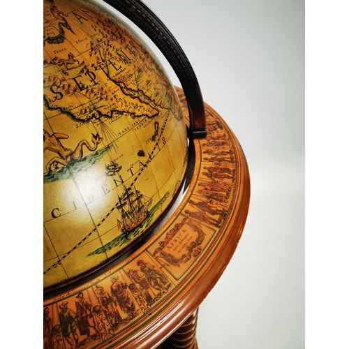 119 - Exceptional quality Terrestrial globe in the form of a drink's cabinet { 104cm H X 75cm Dia }.