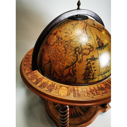 119 - Exceptional quality Terrestrial globe in the form of a drink's cabinet { 104cm H X 75cm Dia }.