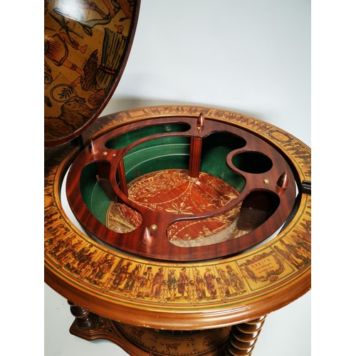 119 - Exceptional quality Terrestrial globe in the form of a drink's cabinet { 104cm H X 75cm Dia }.